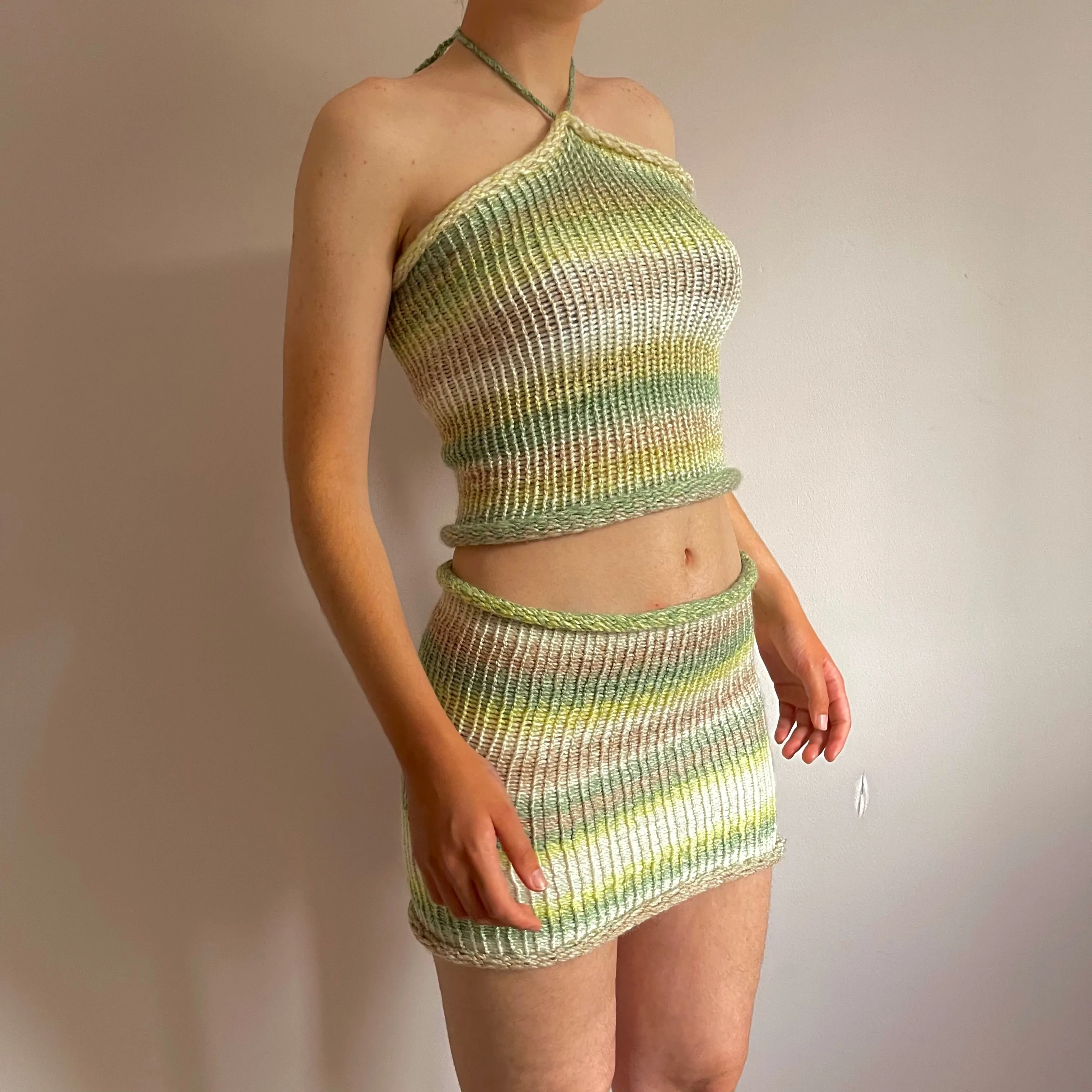 Handmade knitted mini skirt in green, beige and cream