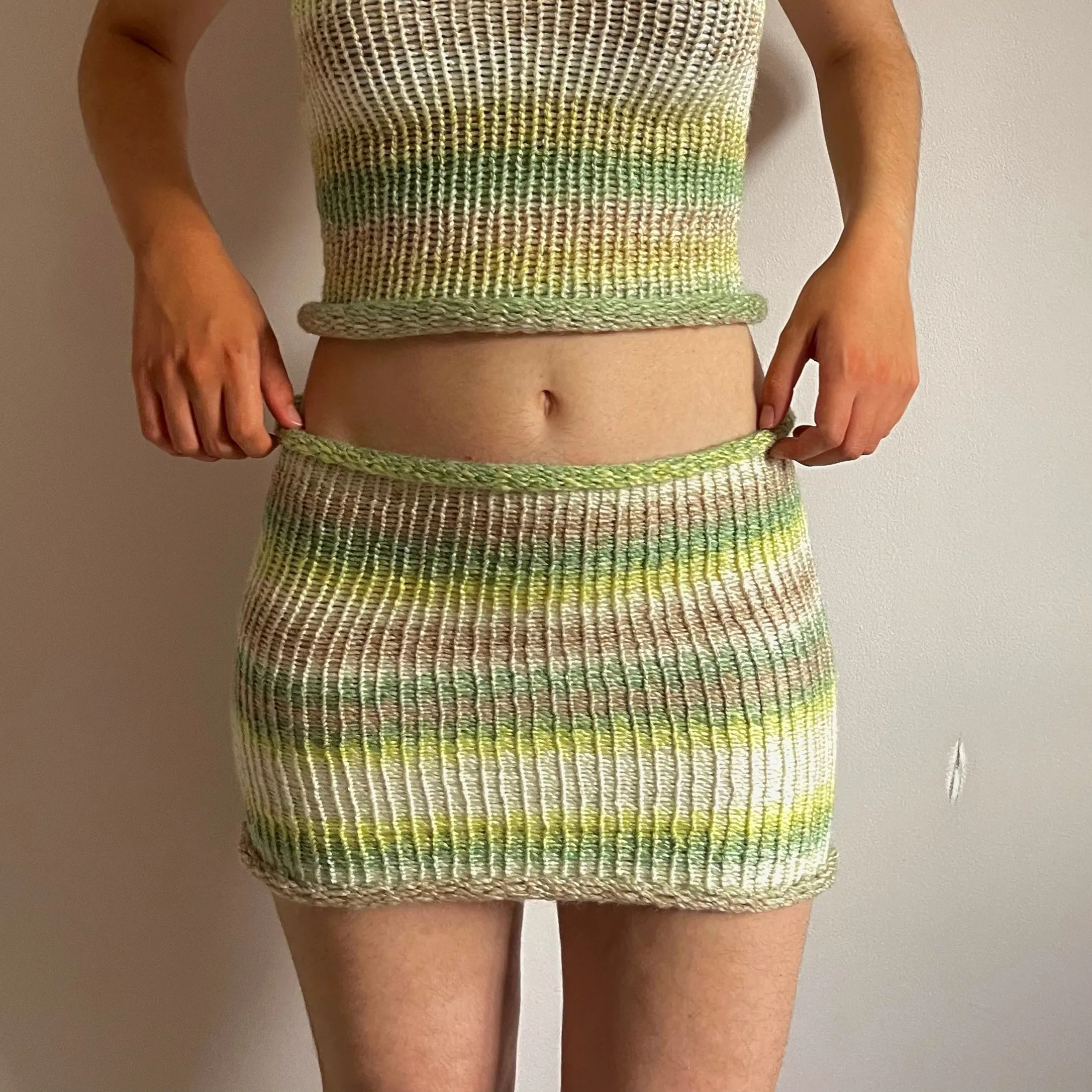 Handmade knitted mini skirt in green, beige and cream